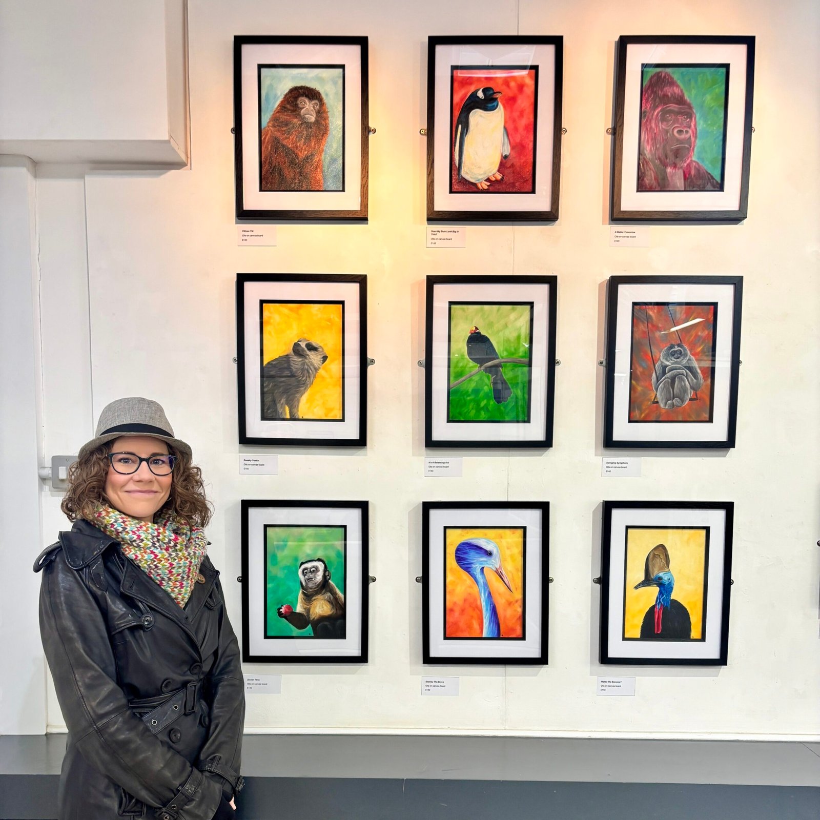 Anne Bardsley Art Wild Reflections Exhibition Feb 2026 Featuring Anne Bardsley Stood In Front Of 9 Framed Paintings